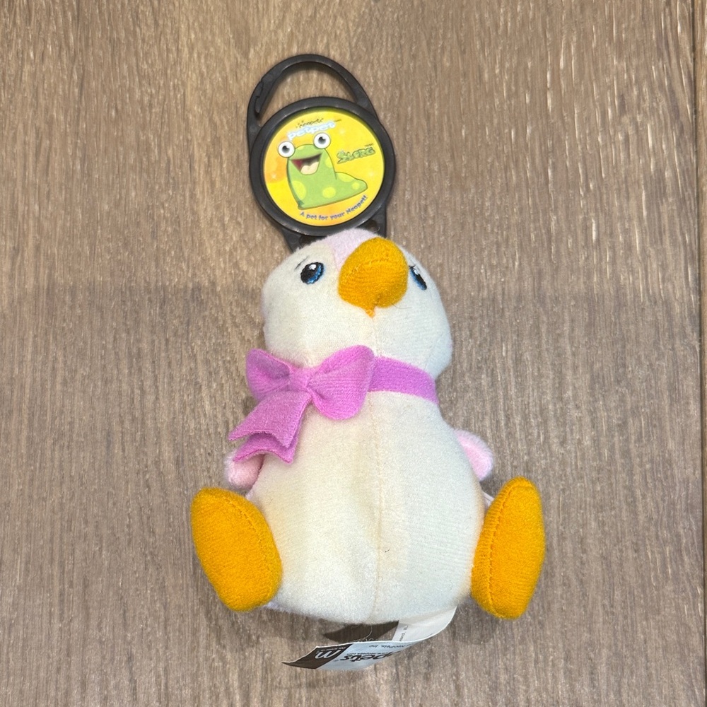 White and Yellow Stuffed Penguin with Pink Bow